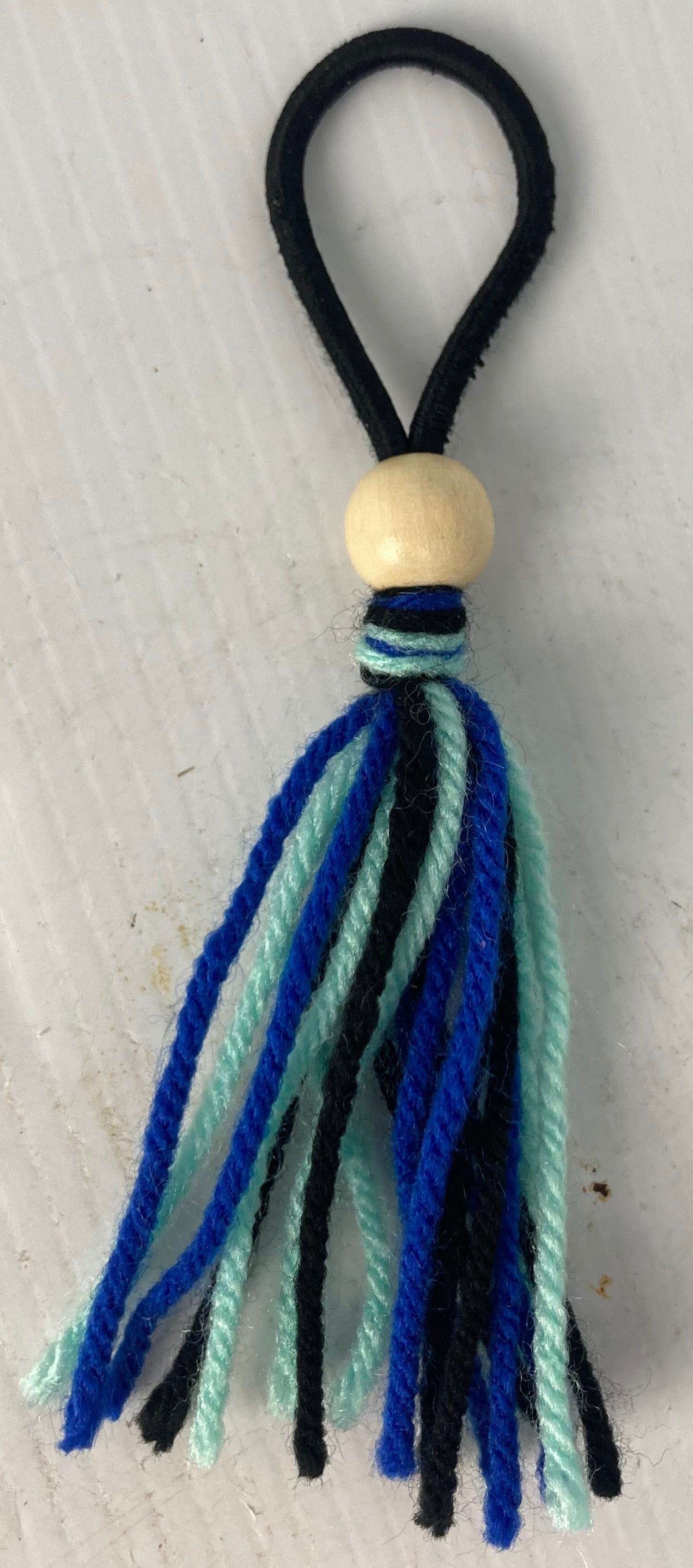 bungee cord type fishing pole ties Yarn Fishing Rod Tie Hugger